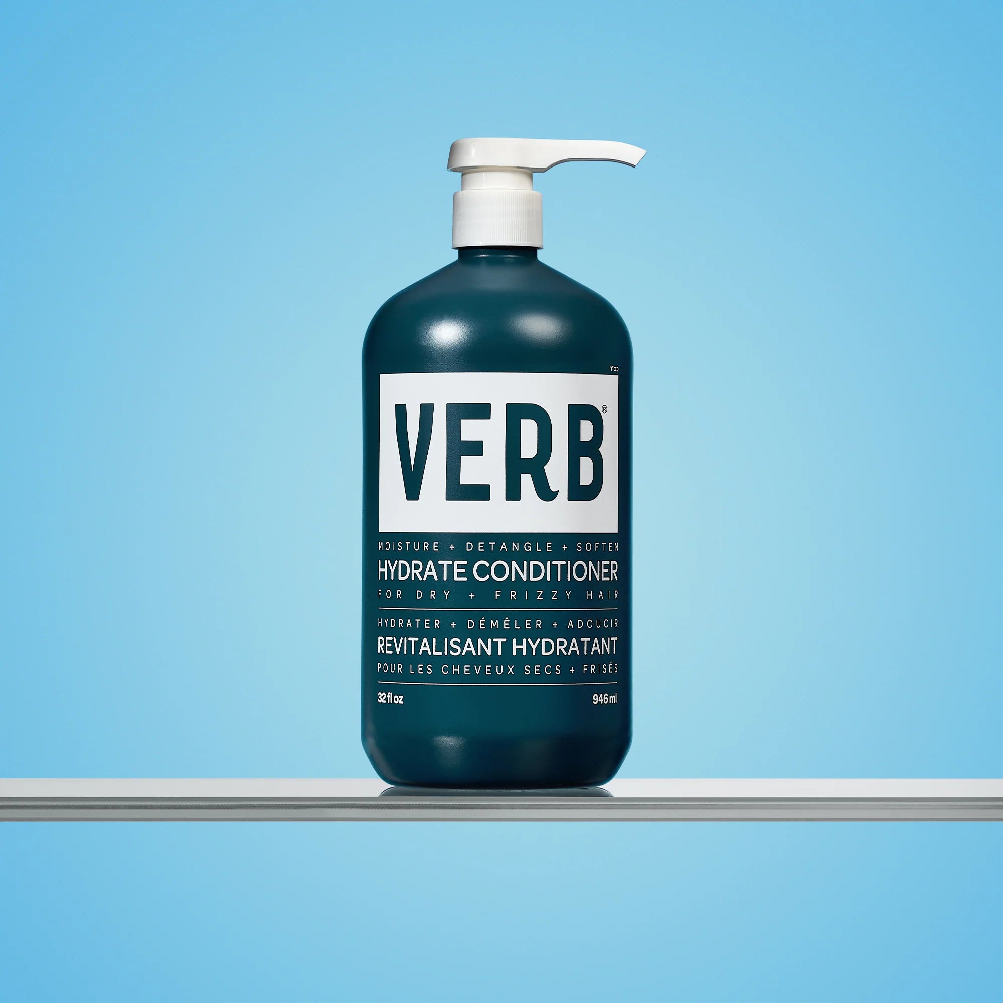 Blue bottle of VERB Hydrate conditioner litre on a white surface with a blue background