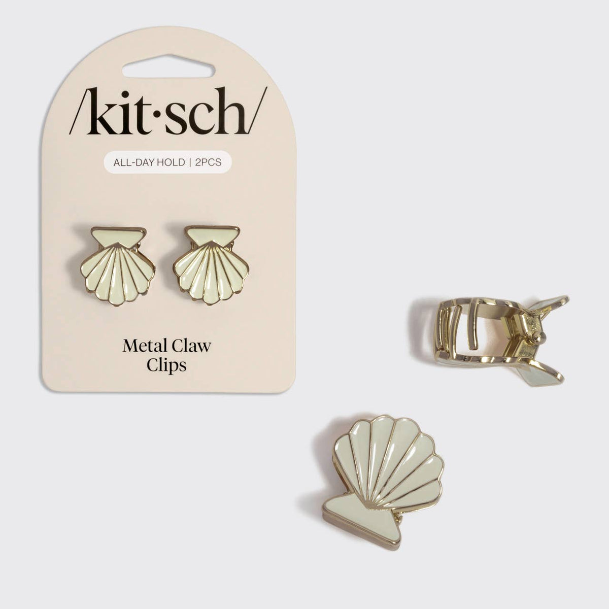 KITSCH Shell-shaped metal claw clips on a 'kitsch' branded card with a single clip displayed separately.