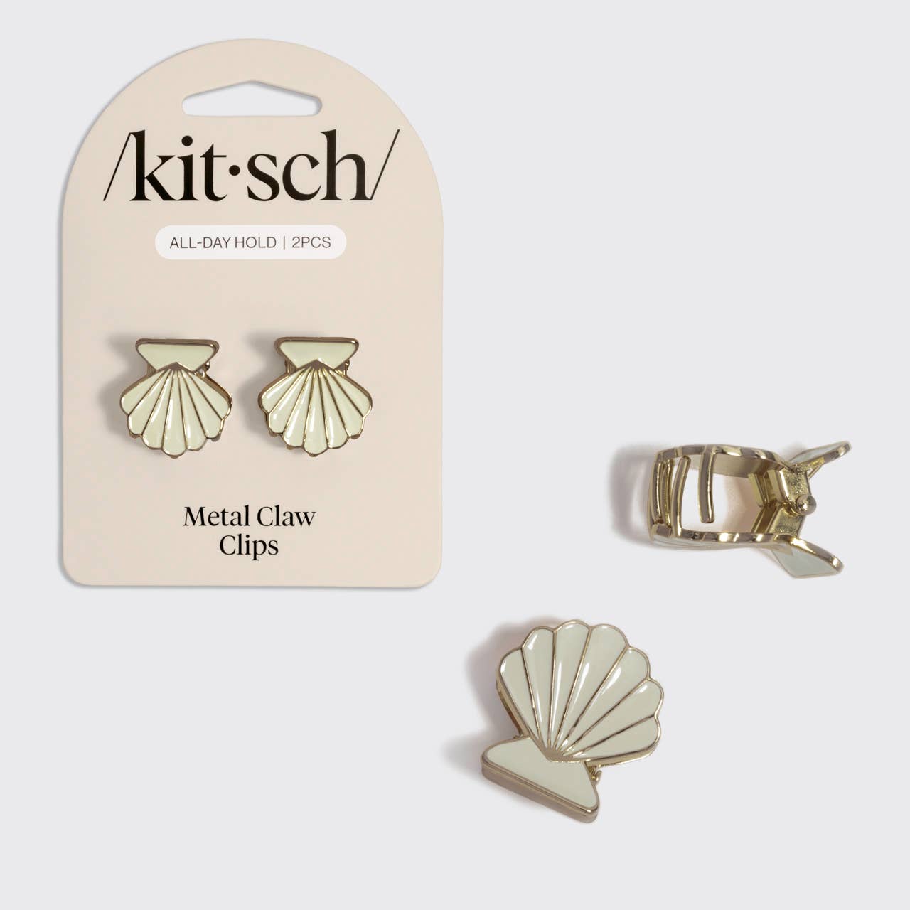 KITSCH Shell-shaped metal claw clips on a 'kitsch' branded card with a single clip displayed separately.