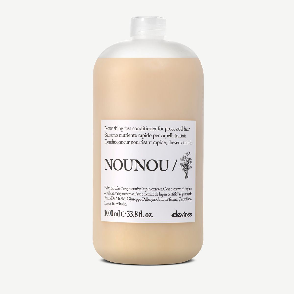 A 1000 ml bottle of Davas Nounou Nourishing Fast Conditioner for processed hair, featuring a beige body, white cap, and a white label with black text, set against a light gray background.