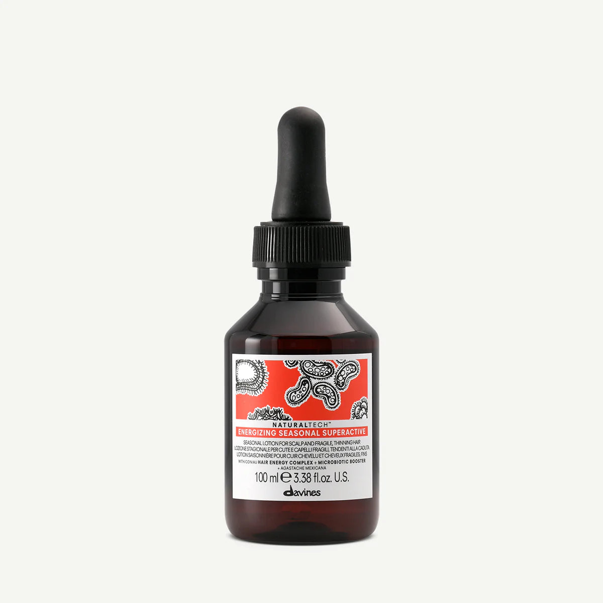 Bottle of Davines Energizing Seasonal Superactive hair product on a white background