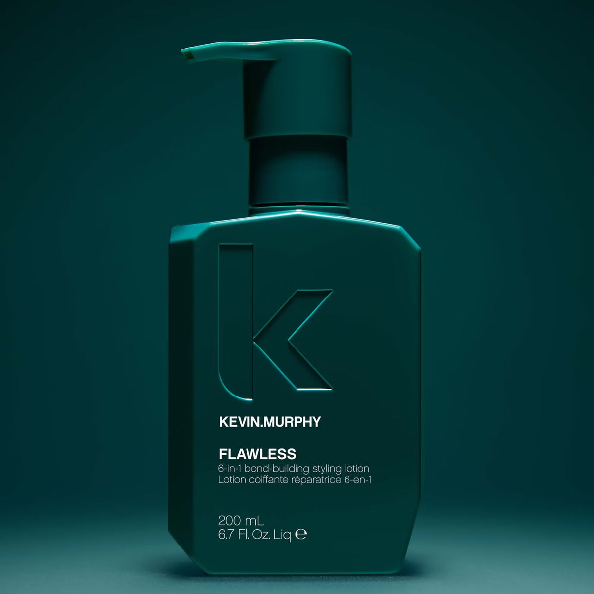 Kevin Murphy Flawless 6-in-1 Bond Building Styling Lotion in a dark teal pump bottle, set against a matching dark teal studio background.