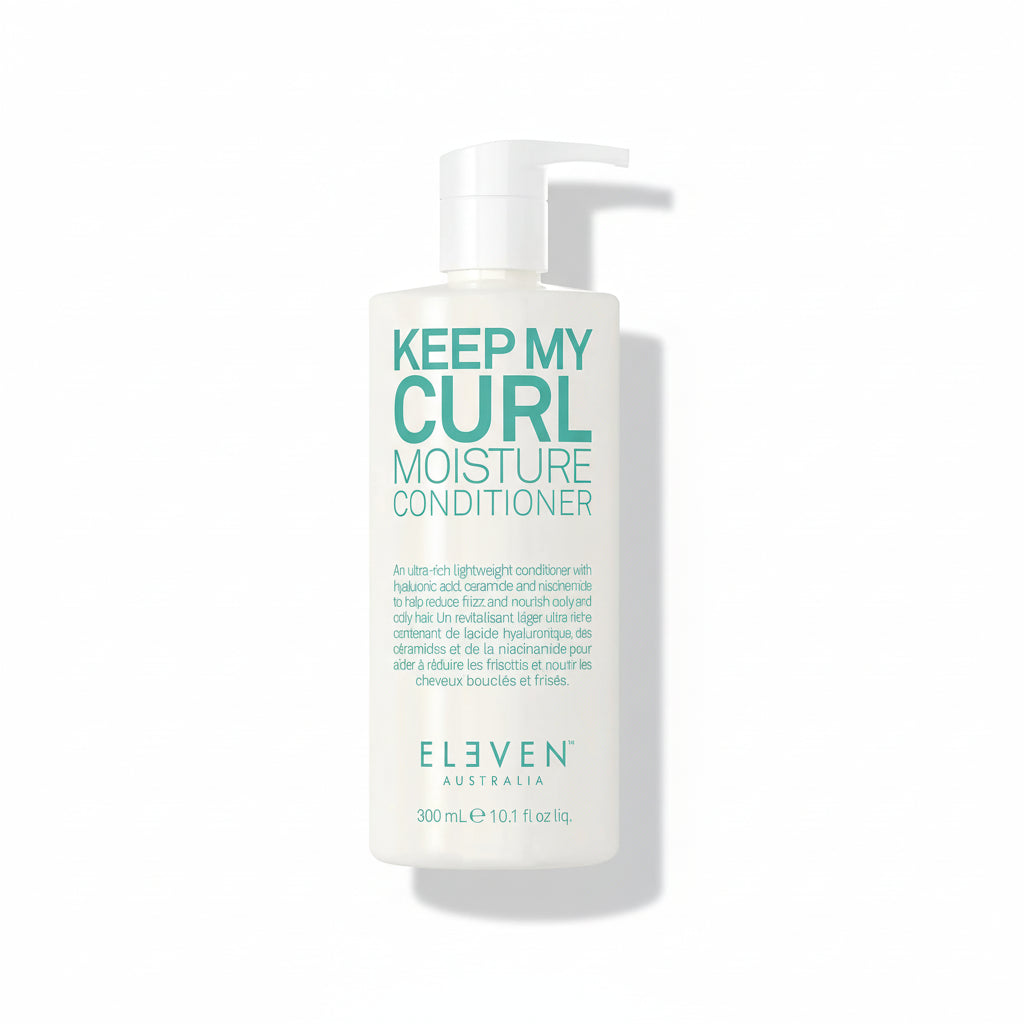 Conditioner bottle labeled 'Keep My Curl Moisture Conditioner' by Eleven Australia on a white background