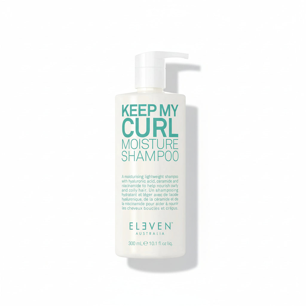 Shampoo bottle labeled 'Keep My Curl Moisture Shampoo' by Eleven Australia on a white background