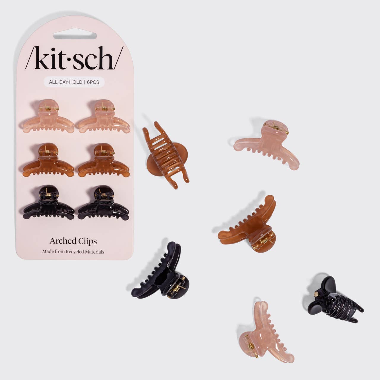 Kitsch Arched Clips set of 8 all-day hold hair clips in assorted colors. Pink, brown and black